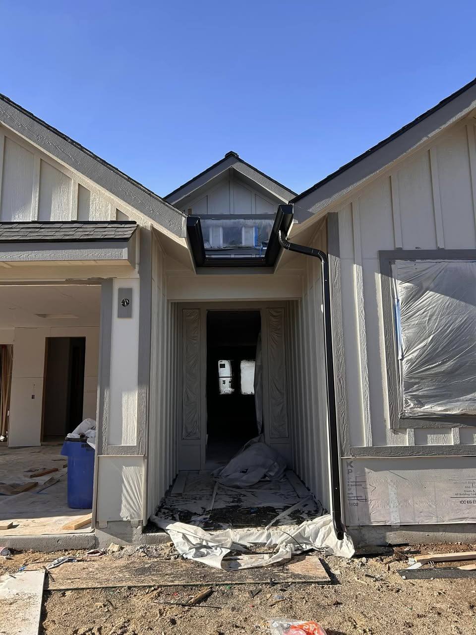 New construction home mid build with the gutter run going on