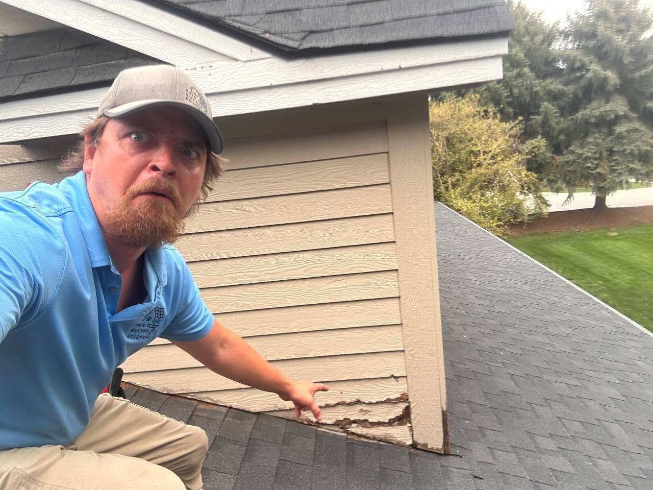 Checking the roofline and fascia condition before quoting the job